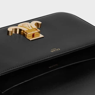 TRIOMPHE SHOULDER BAG IN SHINY CALFSKIN BLACK