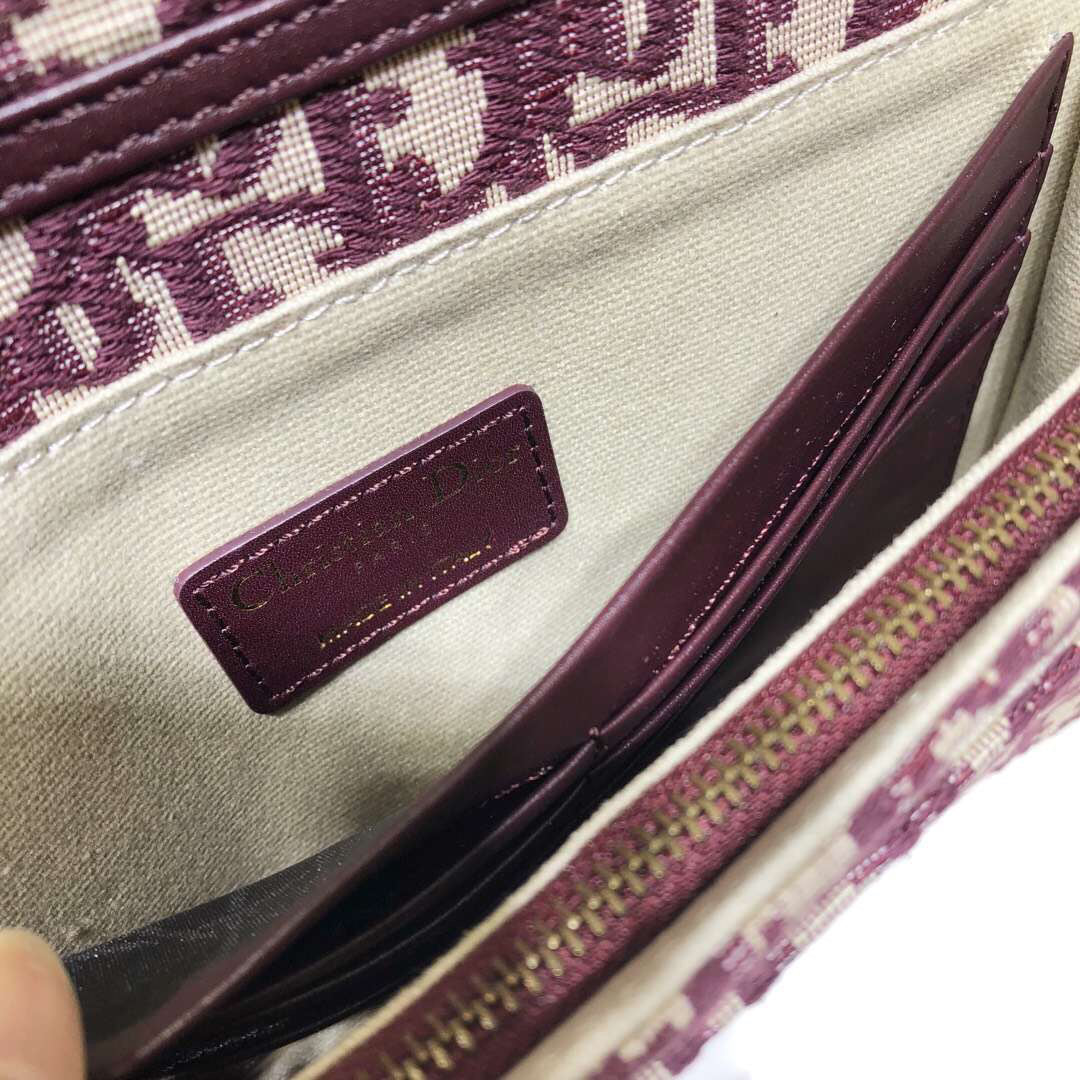D Bordeaux Oblique Saddle Chain Clutch
