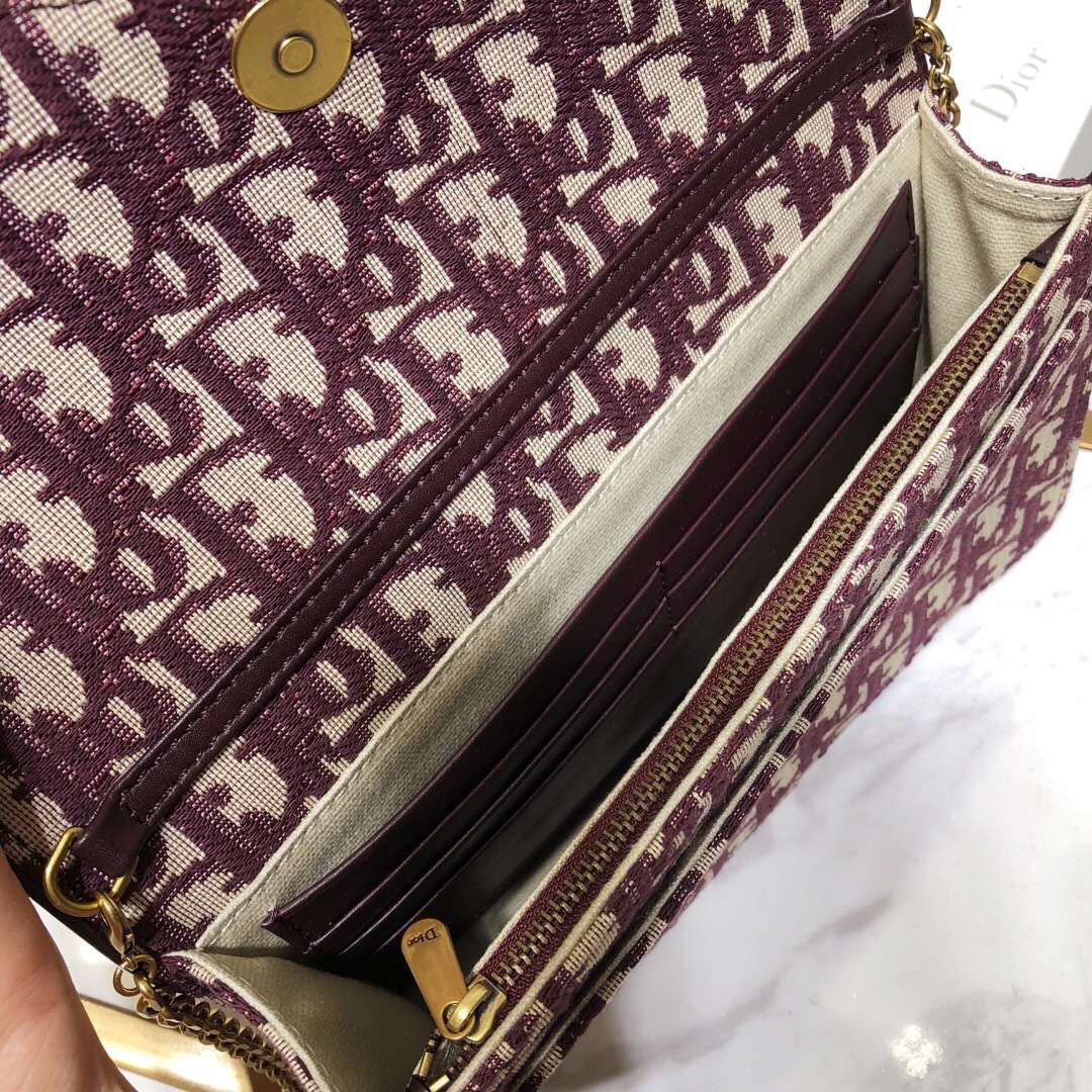 D Bordeaux Oblique Saddle Chain Clutch