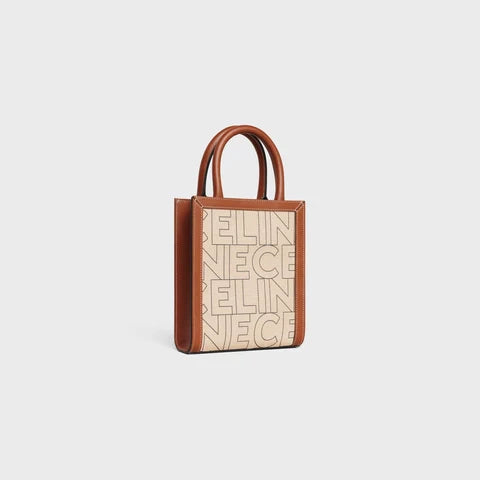 MINI VERTICAL CABAS CE IN TEXTILE WITH CE ALL-OVER PRINT NATURAL / TAN