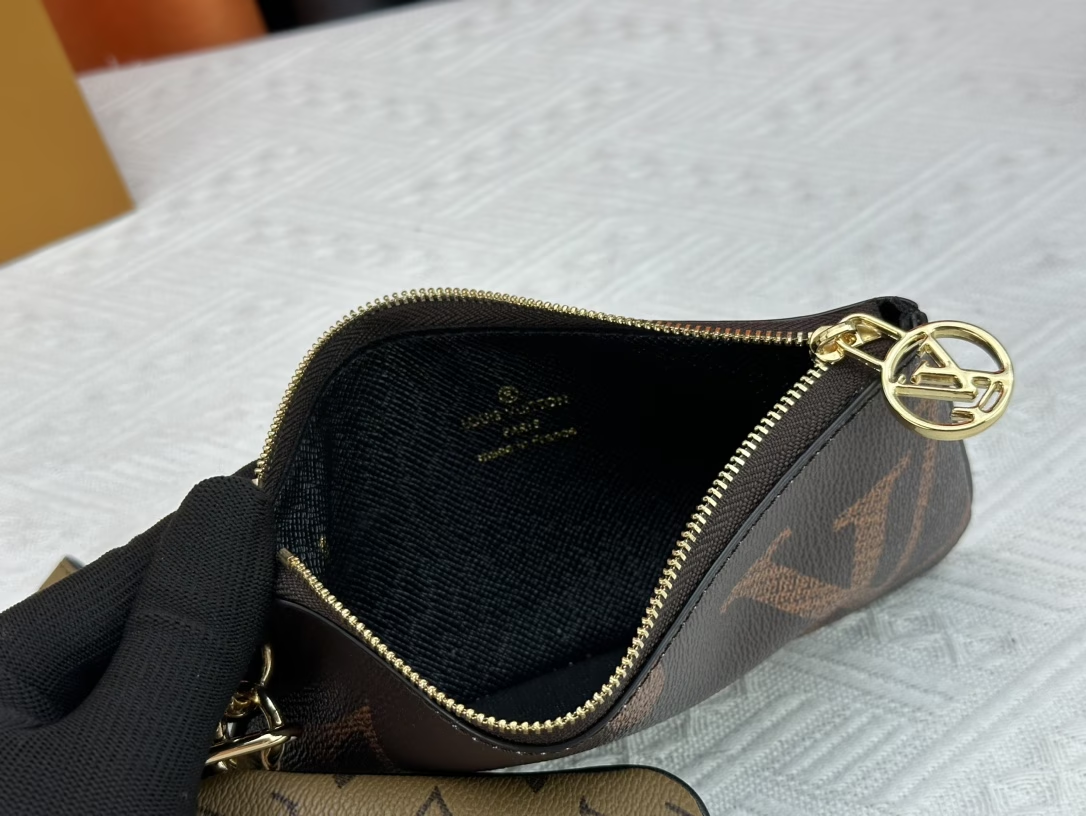 Louis new arrival M68756 TRIO wallet